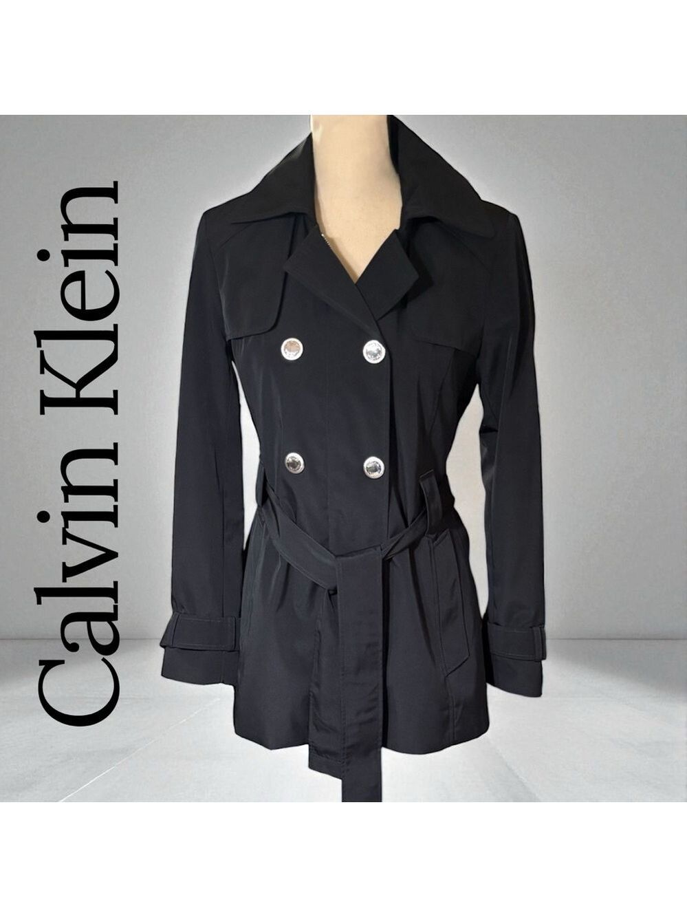 Calvin Klein-Classy black trench coat. Size small. Silver details/Hood. Like new - Picture 13 of 16